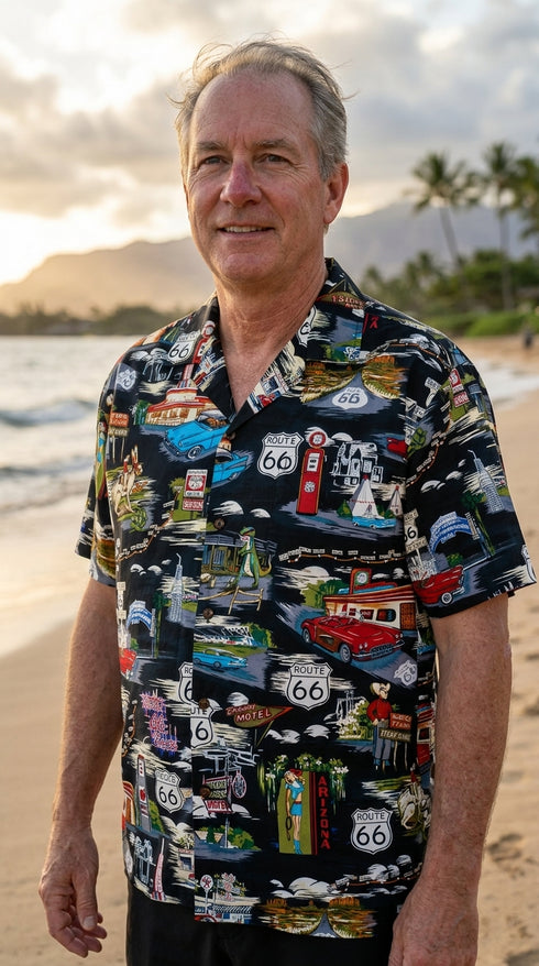 Man on the beach at sunset in the Route 66 Travel Sights men's shirt in black