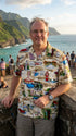 Man on the coast in the Pacific Legend Route 66 men's cotton Hawaiian shirt in khaki